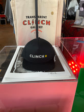 Load image into Gallery viewer, CLINCH/APNJ Stitched Snapback Trucker Hat - Transparent Clinch Gallery
