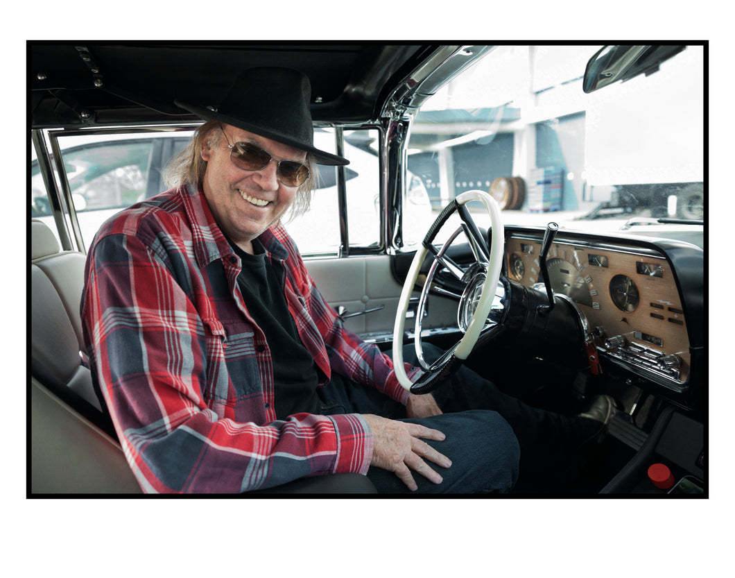 Neil Young in Car Debuting Pono Player (2013)